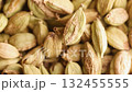 top view close up green cardamom seeds rotating background 132455555