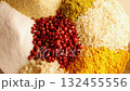 Mix of spices at the glass bowl top view close up rotating background 132455556