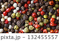 top view close up black red green white and allspice mix peppercorn rotating background 132455557