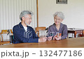 Smiling senior couple using a smartphone 132477186