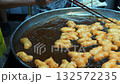 Patongo Fried in Hot Oil at Street Stall in Bangkok Chinatown 132572235
