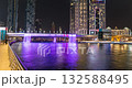 Dubai Illuminated waterfall Sheikh Zayed bridge time-lapse hyperlapse, Water Canal, UAE, skyscrapers, business bay, 132588495