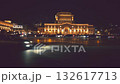 Yerevan, Armenia 24.10.2025 Republic square. A large building of museum with a large archway is lit up at night. The building is surrounded by cars and people 132617713