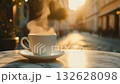 Cappuccino on an Italian cafe terrace bathed in morning light | A quiet, relaxing loop with only steam rising 132628098