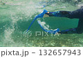 Underwater view of blue flippers in motion 132657943