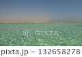 Clear turquoise ocean water with sandy beach 132658278