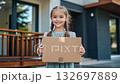 happy little kid hold cardboard box on new home background, house moving and relocation of modern family concept 4k 132697889