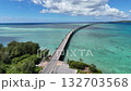 Drone flying horizontally over the turquoise shallows of Miyako Island | View of Irabu Bridge | 4K 132703568