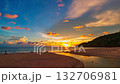 Time lapse Twilight Serenity at Kata beach Phuket. Soft hues of orange, pink, and violet spread across the evening sky, merging with the calm sea in a breathtaking panorama of tropical beauty. 132706981