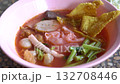 Traditional Thai Yen Ta Fo Noodle Soup in Pink Bowl 132708446
