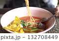 Traditional Thai Yen Ta Fo Noodle Soup in Pink Bowl 132708449