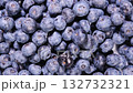 Macro video of fresh blueberries rotating in close-up, highlighting plump berries and their deep blue color and texture 132732321