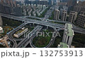 Aerial view of urban traffic interchange and city buildings in Hangzhou, China during daytime 132753913