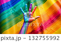 raised fist painted in vibrant rainbow pride colors symbolizes strength, unity, and empowerment for the LGBTQ gay community. Equality and minority human rights concept 4k 132755992