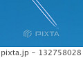 High-flying jet leaves contrail in clear blue sky 132758028
