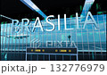 Airlane landing at Brasilia. Arrival in the city with reflection of airport and aircraft 132776979