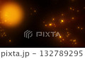 Golden glowing particles scattered on a dark background 132789295