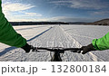 Winter Wonderland. Fat Biking Across a Frozen Lake - Scenic Adventure Cycling Experience. Exploring Frozen Lake Trails on a Fat Bike - Thrilling Winter Ride in Snowy Landscape. 132800184