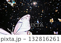 Delicate butterflies drift gracefully through a shimmering night sky filled with stars, creating a captivating visual experience 132816261