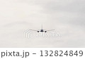 Passenger jet climbing into the blue sky after takeoff 132824849