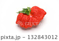 4K video of a fan-shaped strawberry turning on a white background - Loopable 132843012