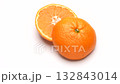 4K video of a mandarin orange cut in half slowly rotating against a white background 132843014