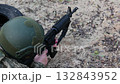 A soldier aims a rifle during a tactical training exercise. . 132843952