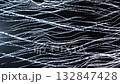 Dynamic flow of organic fiber patterns on dark background 132847428