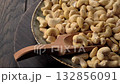 Dolly shot of bowl filled with cashew nuts 132856091