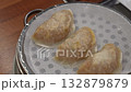 Korean style food. Steamed dumplings 132879879