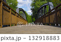 Cycle path leading across the post-war double-span truss bridge in Kamienna Gora, Lower Silesia, Poland. 132918883