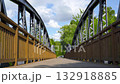 Cycle path leading across the post-war double-span truss bridge in Kamienna Gora, Lower Silesia, Poland. 132918885