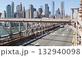 Cars on Brooklyn Bridge. New York City Manhattan skyline, downtown cityscape. World Trade Center. 132940098