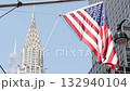 New York, american flag waving. Chrysler building. Manhattan midtown city street banner, patriotism. 132940104