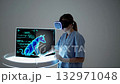 Veterinarian wearing vr headset examining a blue glowing hologram of a dog, interacting with virtual elements and animal diagnostics data in a futuristic healthcare environment 132971048