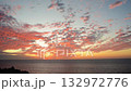 Time lapse of the sea and clouds dyed in the sunset 132972776