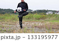 Close-up of a soccer player practicing lifting 133195977