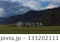 Aerial view of fields and mountains 133202111