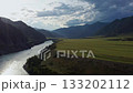 Aerial view of the valley with the river between the mountains 133202112