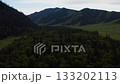 Aerial view of fields and mountains 133202113