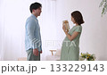 Young partner giving a gift to a pregnant woman Young partner giving a gift to a pregnant woman 133229143