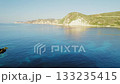 Peaceful sea and coastal cliffs of Kefalonia Greece during golden hour 133235415