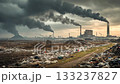 An industrial landscape with smoking pipes and waste 133237827