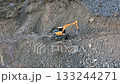 Construction equipment, a wheeled excavator, collects stones. November 15, 2025, Kyrgyzstan, Ak-Tyuz 133244271
