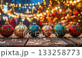 Colorful christmas ornaments displayed at a festive holiday market. 133258773