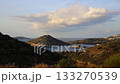 A time lapse view of the Gumusluk neighborhood of the famous holiday resort Bodrum from a distance under the clouds 133270539