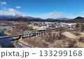 The steam locomotive "Taiju" running under the blue sky and at the foot of the snowy mountains | Scenery of the Kinugawa River | Drone photography 133299168