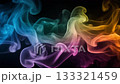 A fantastic loop of vibrantly colored smoke flowing against a black background 133321459