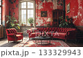 Red velvet sofa and armchair sit in a living room with red, textured walls. 133329943