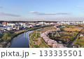 Tsurumi River in spring | Contrast between the cherry blossoms on the riverbank and the bridge | Drone photography 133335501